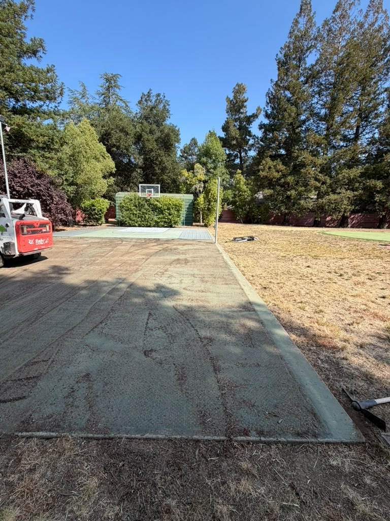 Bobcat Removing Concrete Slab