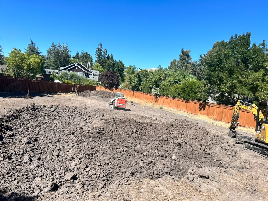 Excavator & Bobcat on Grading Site